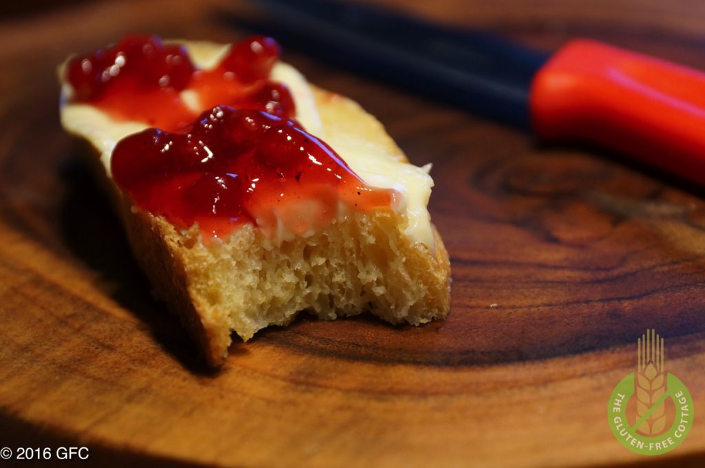 Enjoy a slice of yummy gluten-free French bread with butter and jam (or white bread). 