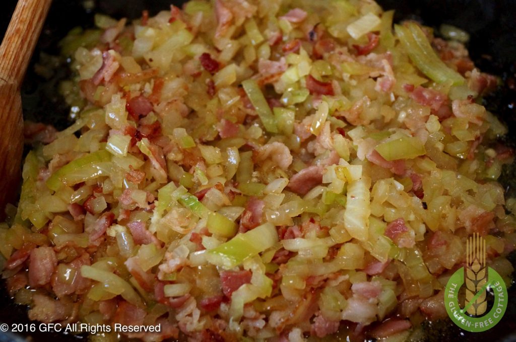 Pan-fried bacon, onions and garlic (gluten-free quiche Lorraine).