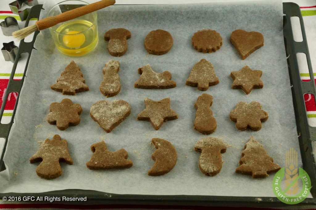 After the cookies are cut out (gluten-free gingerbread cookies).