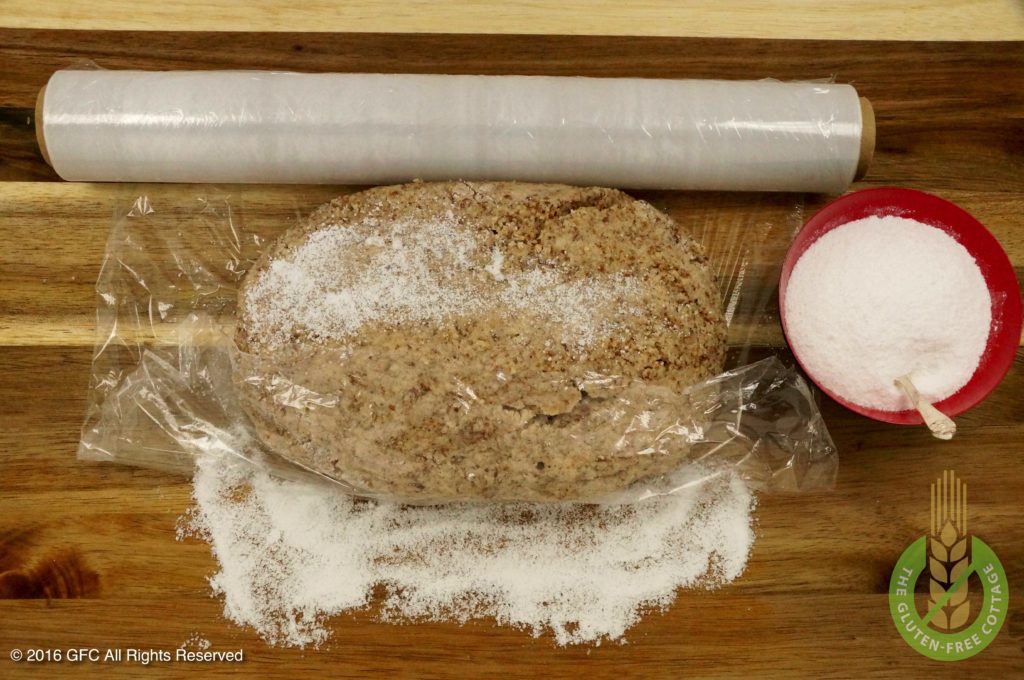 Wrap dough in plastic (gluten-free cinnamon cookies).
