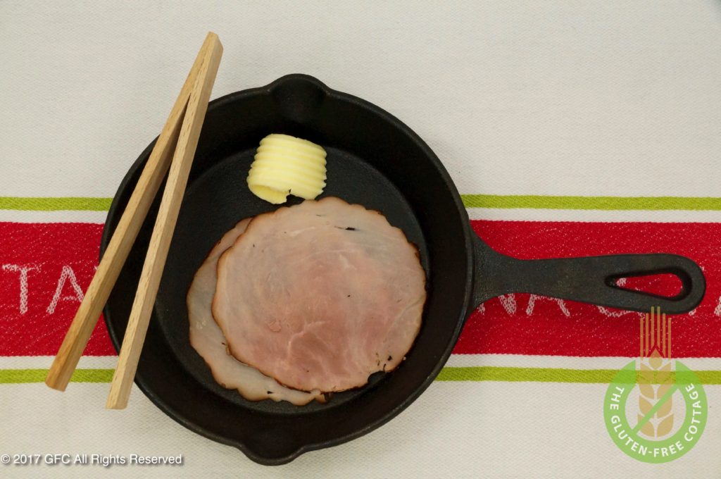 Pan-fry smoked ham in a skillet (gluten-free eggs Benedict).