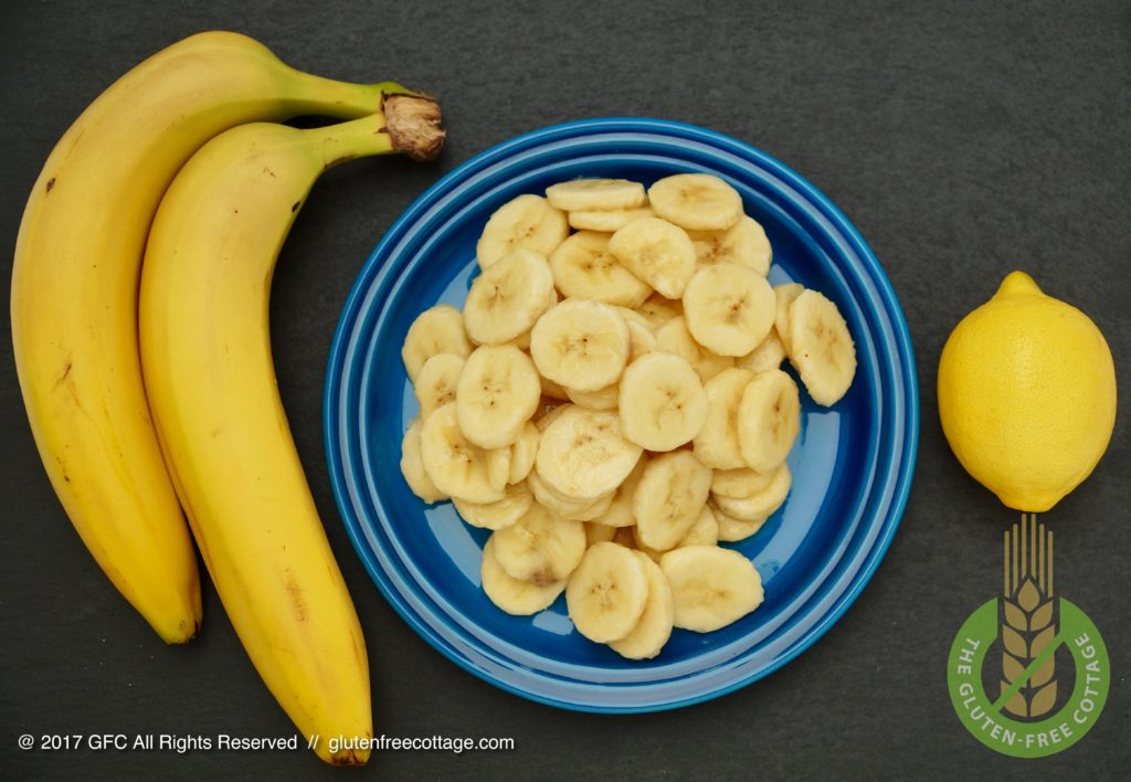 Banana slices coated in lemon juice (gluten-free banana cake with chocolate glaze).